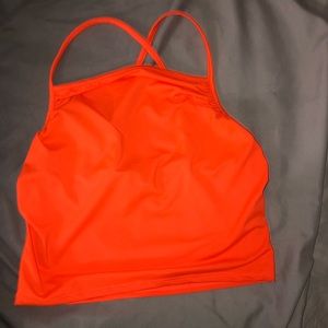 Neon orange top.